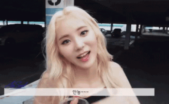 gif of Jinsoul from Loona waving at the camera - LOONATV